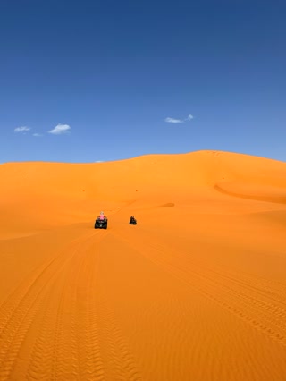 Dos quads sobre las dunas